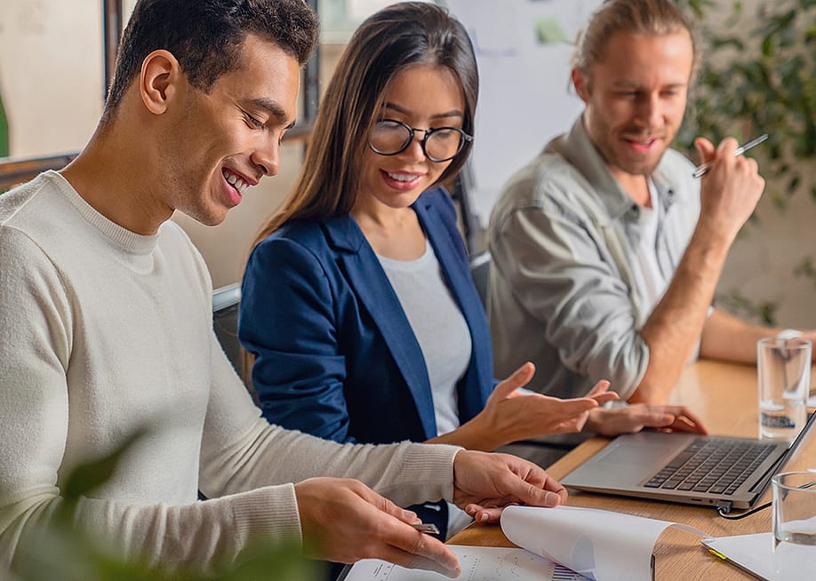 A startup business team working on a project together. — Inside Creative House // Shutterstock