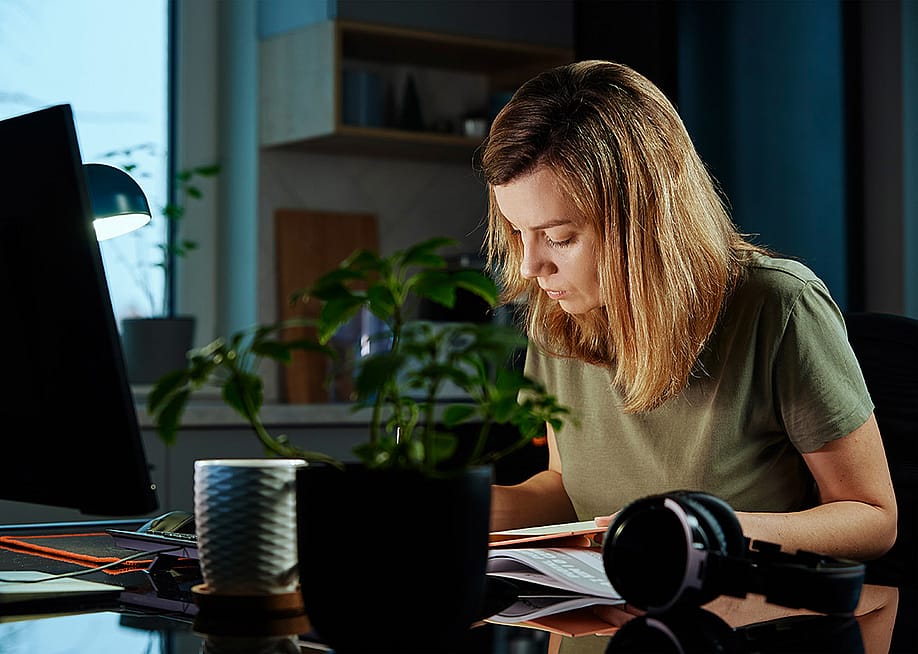 A woman busy working from home. — Lazy_Bear // Shutterstock