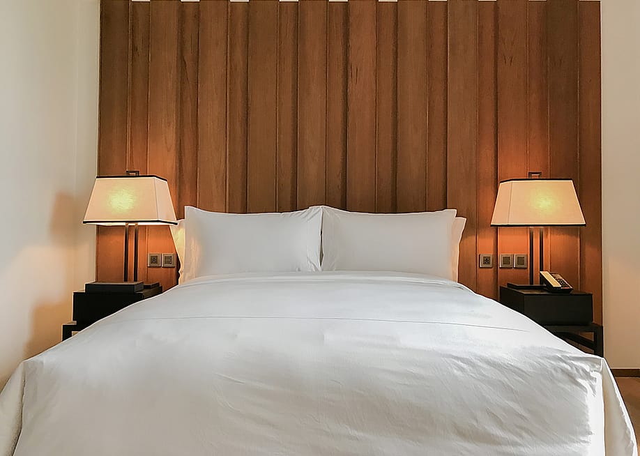 A well-kept bed. — PrasongTakham // Shutterstock