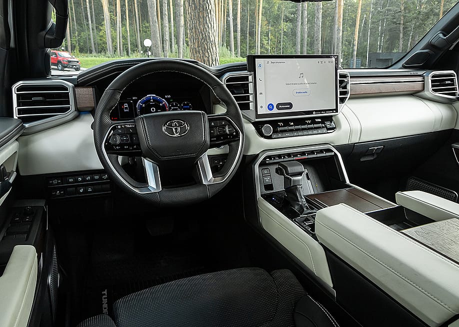 The interior of new modern SUV car with automatic transmission. — Everyonephoto Studio // Shutterstock