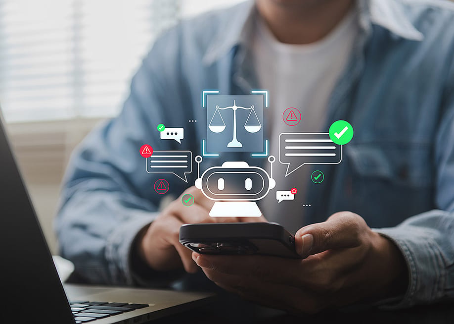 AI chatbot graphics over a user's smartphone. — pixadot.studio // Shutterstock