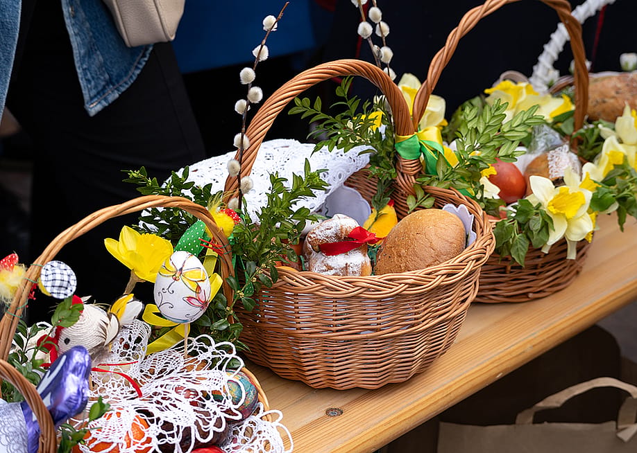 Easter basket offerings for church. — Longfin Media // Shutterstock
