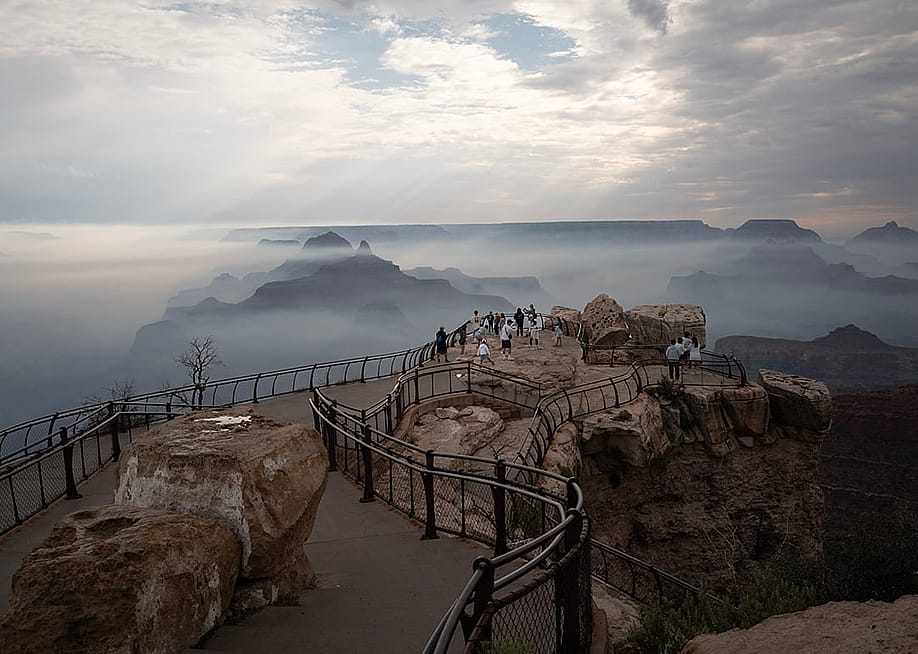 Smoke from the Dragon Bravo fire settles into the Grand Canyon along the South Rim at Mather point on July 17, 2025 in Grand Canyon, Arizona. — Scott Olson // Getty Images