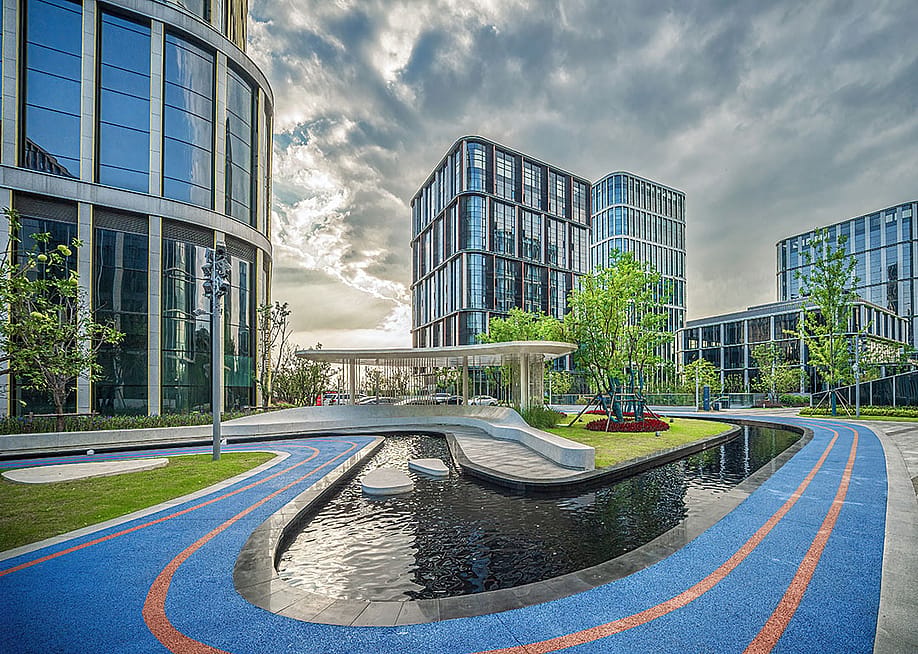 View of buildings of an urban business district with modern, sustainable architecture. — John_T // Shutterstock