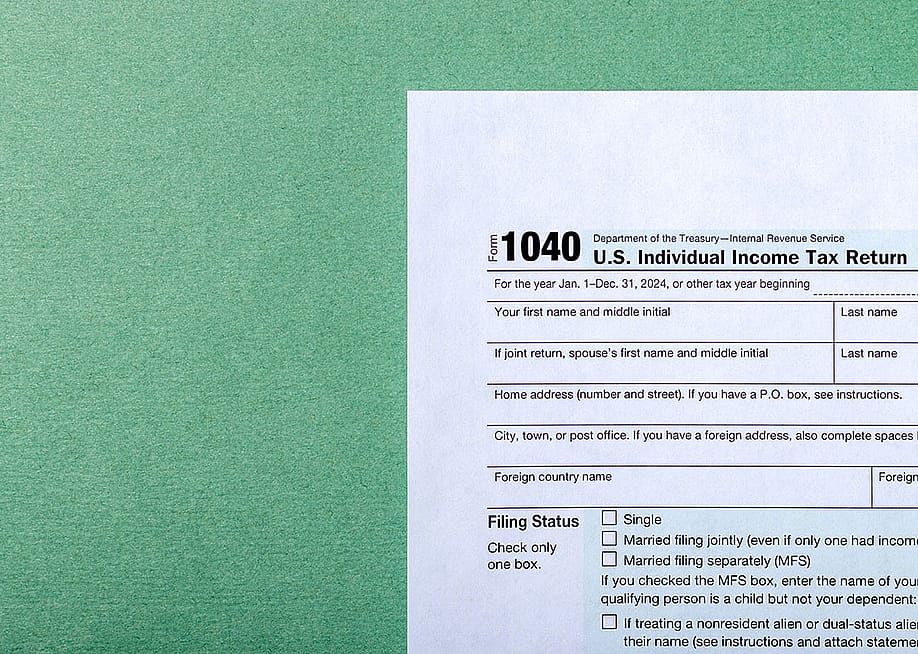 A 1040 tax document. — lyalya_go // Shutterstock