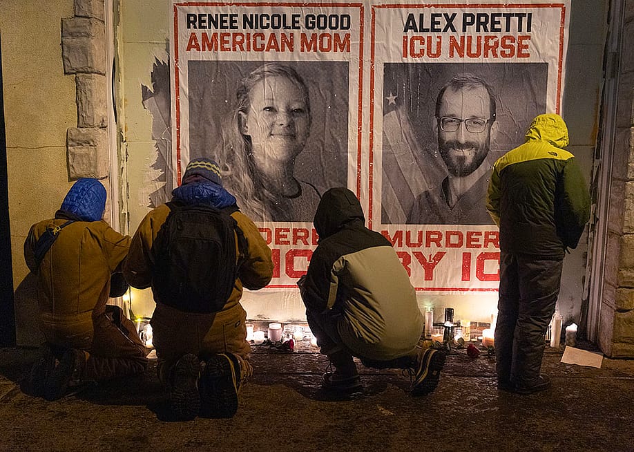 People attend a candlelight vigil organized by healthcare workers at the site where Alex Pretti was killed on January 24, 2026 in Minneapolis, Minnesota. — Scott Olson // Getty Images
