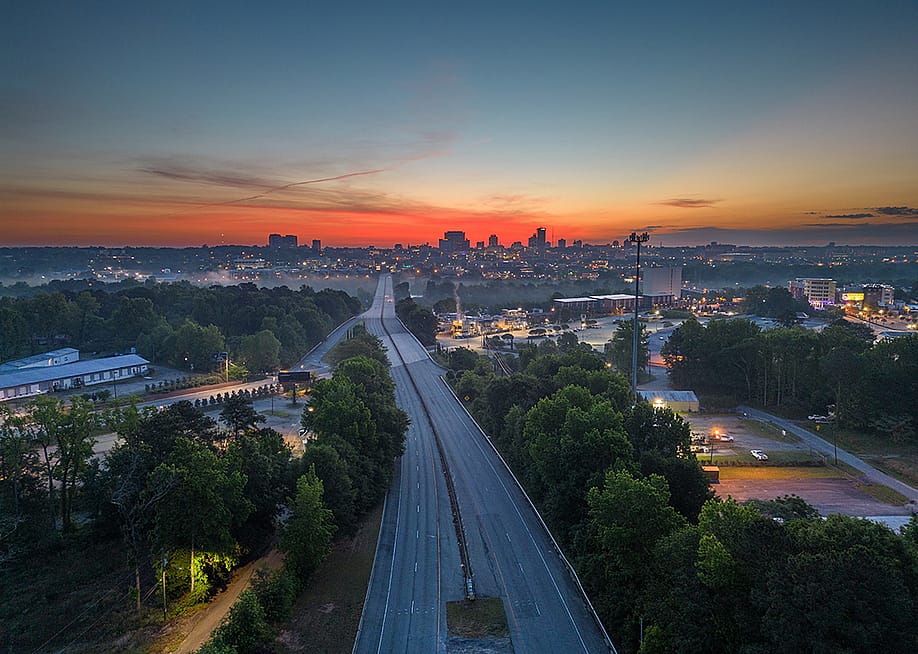 A top view of a highway into Columbia, South Carolina, USA at dawn. — Sean Pavone // Shutterstock