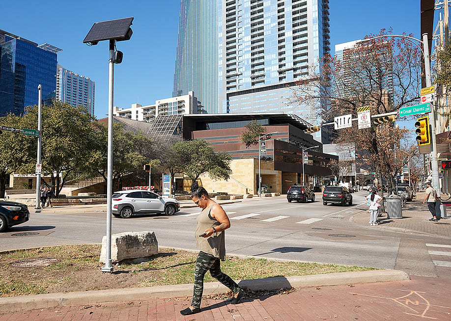 A surveillance camera is seen in the median of West Cesar Chavez Street at Lavaca Street next to Austin City Hall in Texas. — Jay Janner // The Austin American-Statesman via Getty Images