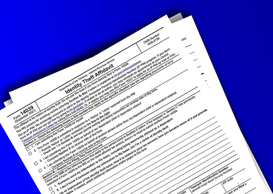 Identity Theft Affidavit forms. — Buy this Image Now // Shutterstock