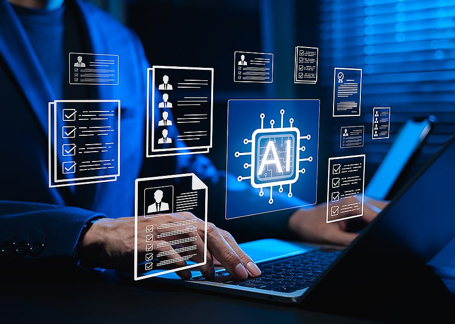 Businessman using a laptop illustrated with AI-powered software graphics. — SuPatMaN // Shutterstock