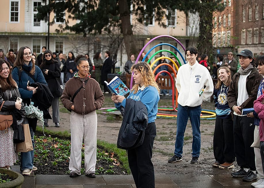 People taking part in a Heated Rivalry lookalike contest inside Soho Square Gardens, London, England. — John Phillips // Getty Images