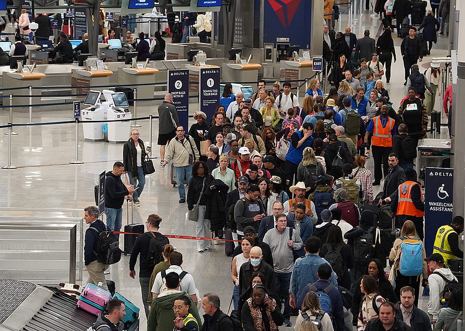 ravelers wait in long lines at Hartsfield-Jackson Atlanta International Airport on March 16, 2026 in Atlanta, Georgia. — Megan Varner // Getty Images