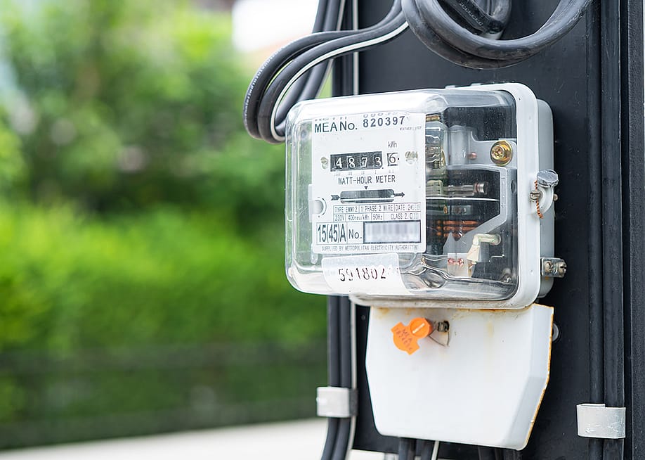 An electric meter measuring power for energy costs. — sasirin pamai // Shutterstock