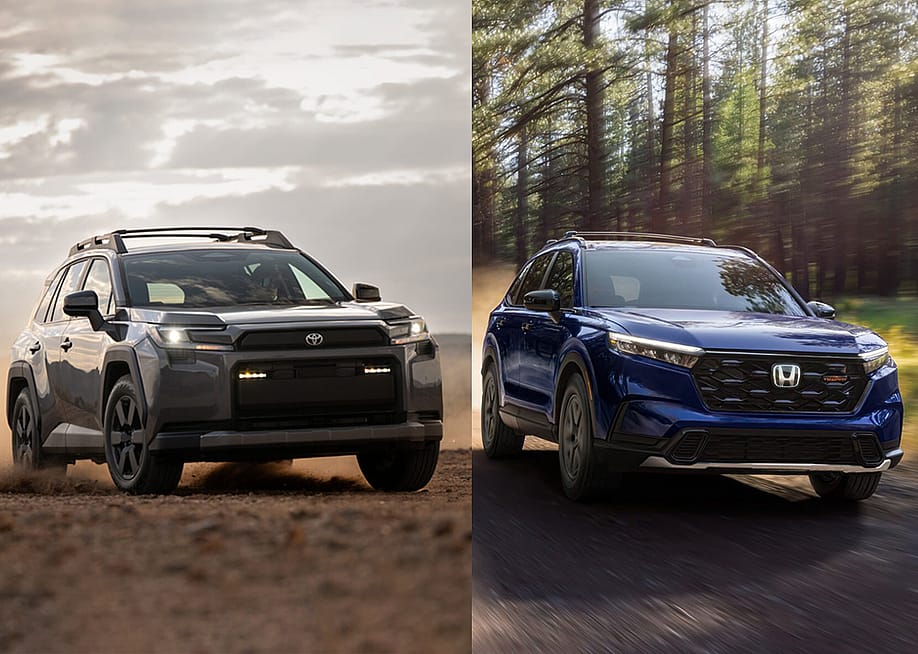 A side-by-side photo of a Honda CR-V and a Toyota RAV4. — Toyota, Honda