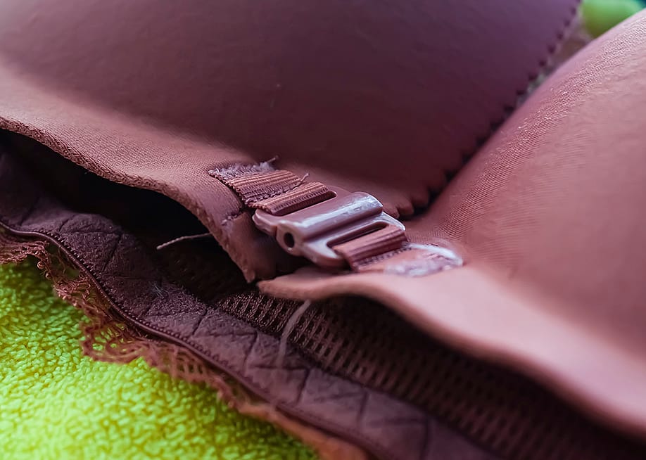 Close up on the clasp of a front-close bra. — Peerapatstockshot // Shutterstock
