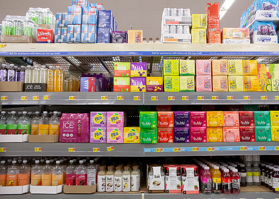 A view of several shelves of sparkling water. — The Image Party // Shutterstock