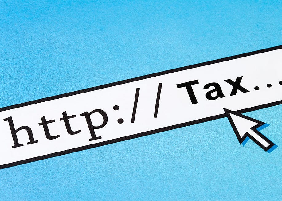 A URL bar with 'http tax' as the address as a concept of tax filing online. — Feng Yu // Shutterstock