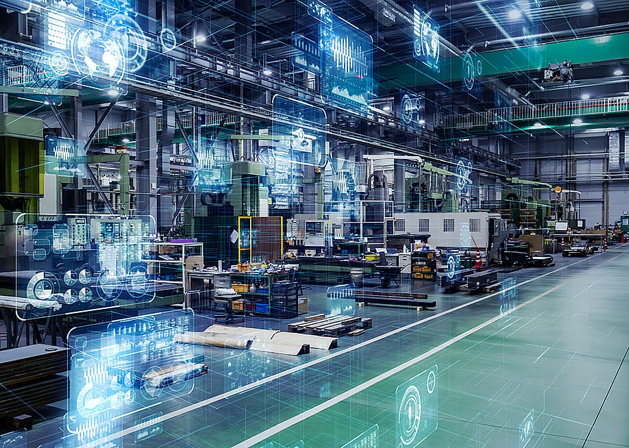 Large digital machines and tools inside a manufacturing warehouse. — metamorworks // Shutterstock