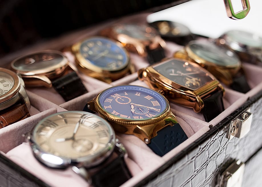 A set of men's luxury wrist watches in a storage box. — AV_photo // Shutterstock