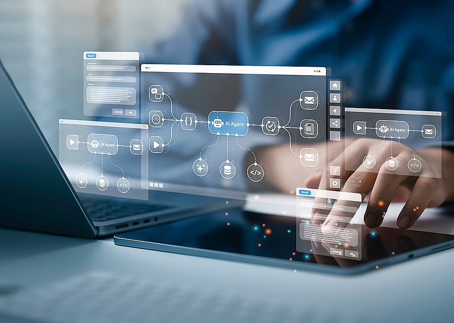 An analyst working on AI workflow automation concept and data tools. — Deemerwha studio // Shutterstock