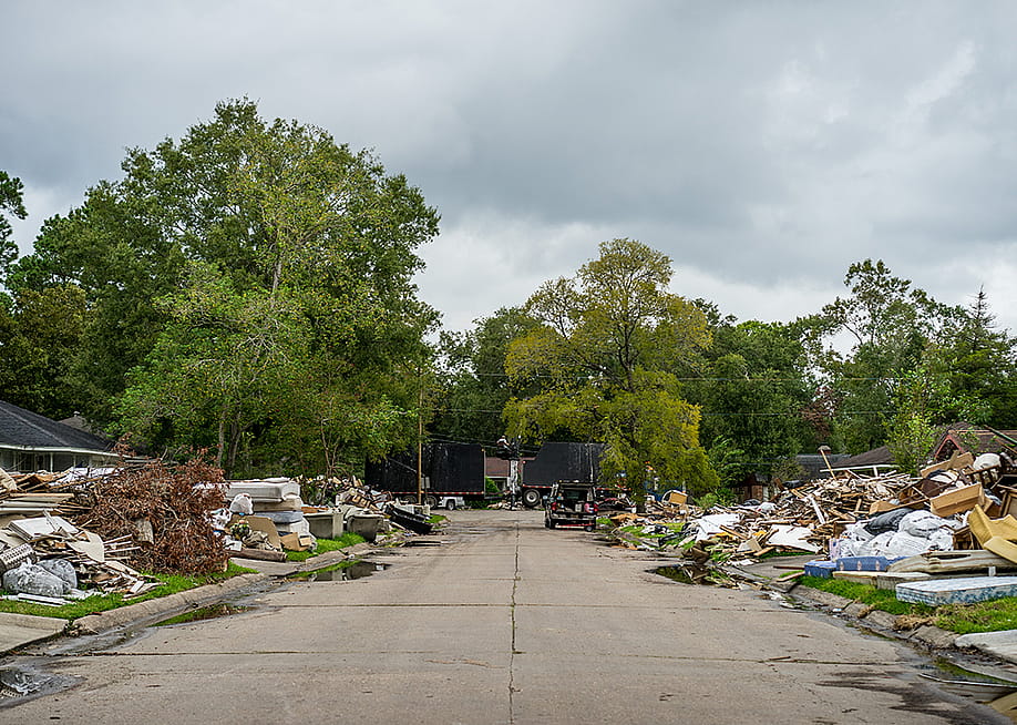 Debris along a residential neighborhood hit by Hurricane Harvey. — Cire notrevo // Shutterstock