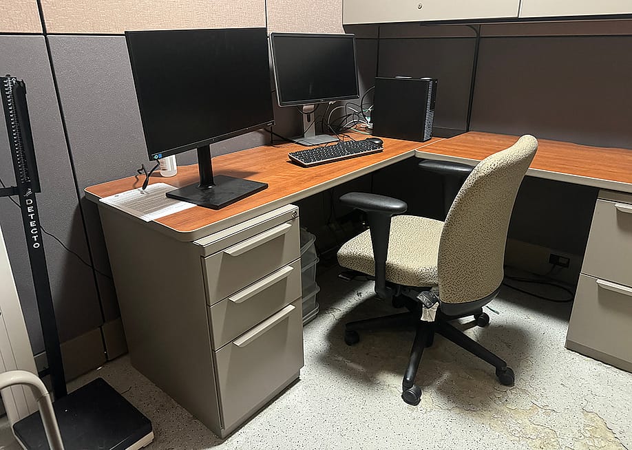An empty office cubicle. — Alexandra Adele // Shutterstock