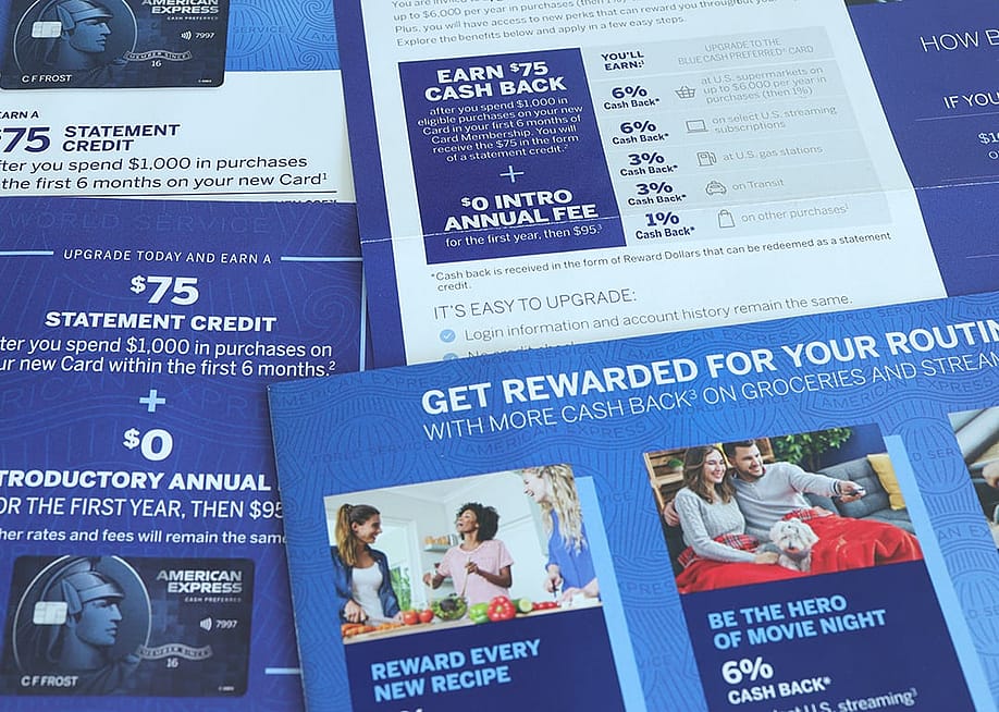 Cash back rewards and offers printed on pamphlets of a bank. — Deutschlandreform // Shutterstock