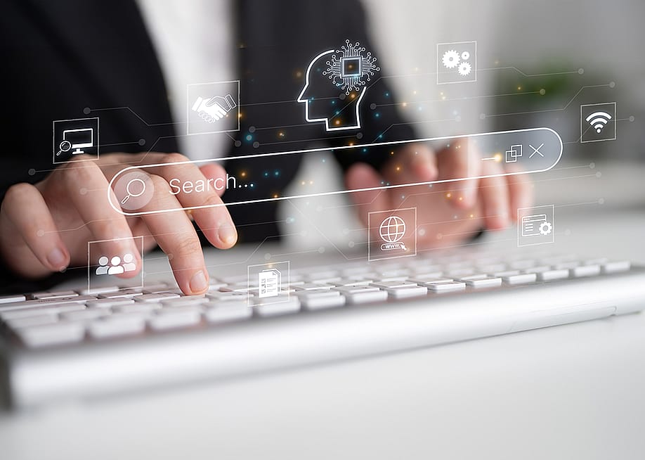Generative search engine graphics illustrated over a person typing on a keyboard. — Summit Art Creations // Shutterstock