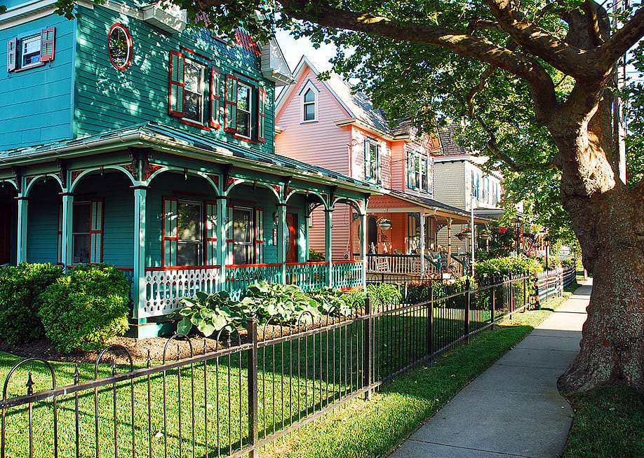 A street of Victorian-style houses in Cape May, New Jersey, USA. — James Kirkikis // Shutterstock