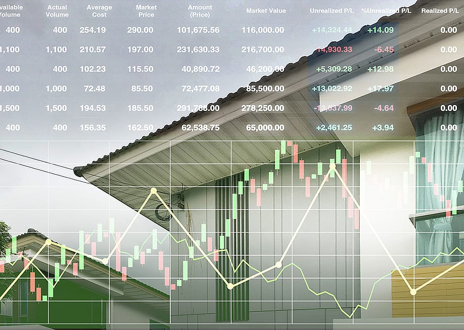A stock financial index and a house property at the background. — ekapol sirachainan // Shutterstock