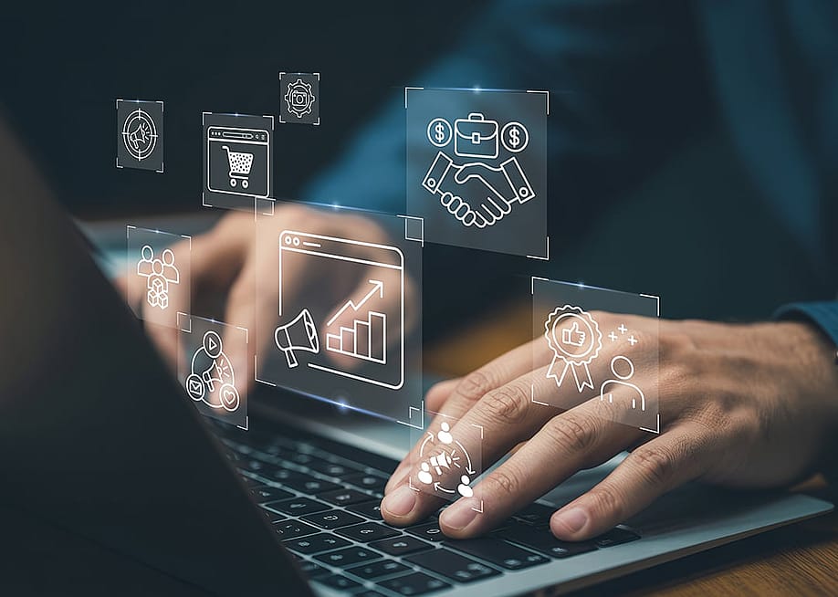 Businessman navigating a system illustrated with virtual marketing automation graphics. — Keimani Storment // Shutterstock