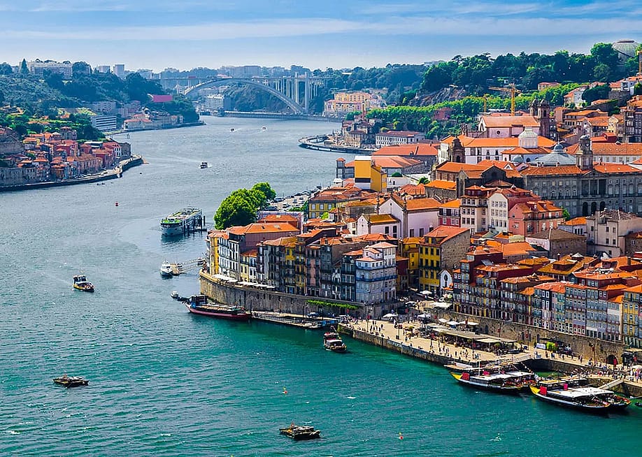A scenic view of Porto, Portugal along the Douro River. — EF Ultimate Break