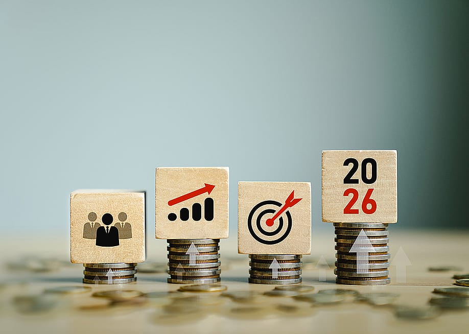 Wooden blockes with team forecast and 2026 growth goals graphics as a concept of economic forecast. — Sutthiphong Chandaeng // Shutterstock