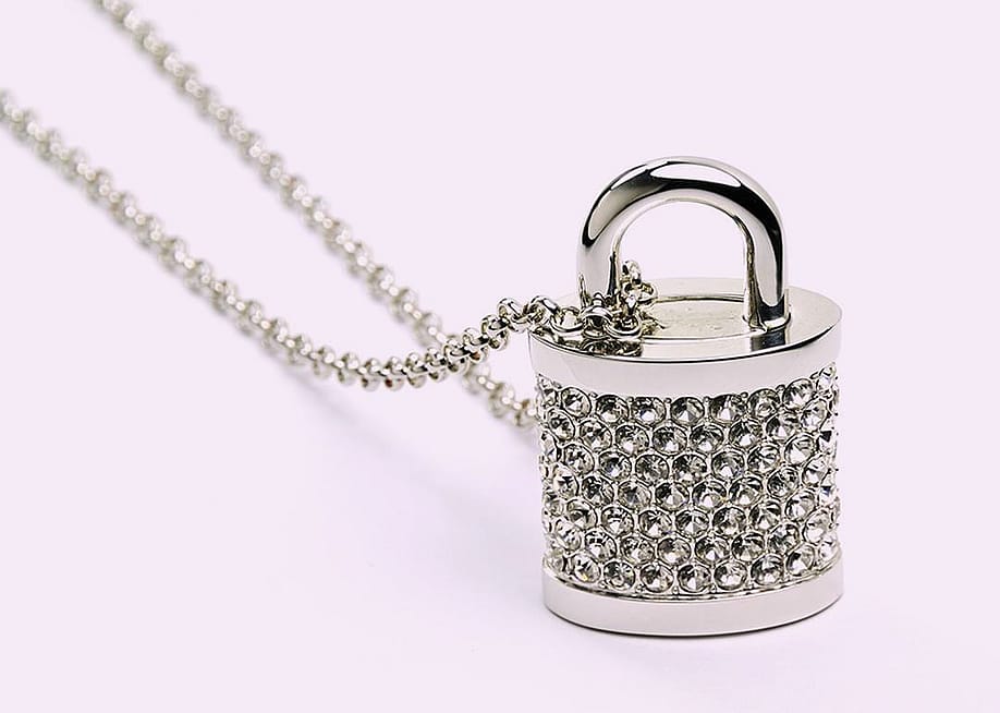A bejeweled padlock with a string. — Tshooter // Shutterstock