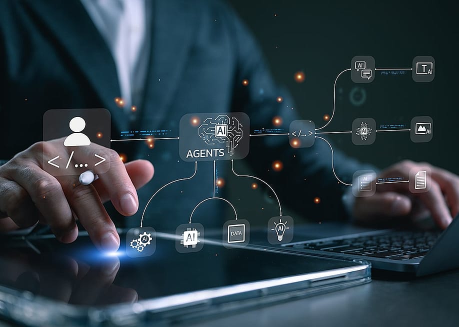 Agentic AI workflow graphics over a businessman using a laptop and tablet for productivity. — LookerStudio // Shutterstock