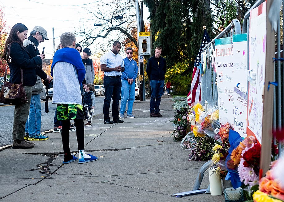People gathering and paying their respects at a memorial, one year after the shooting at the Tree of Life synagogue in Squirrel Hill, Pittsburgh, USA. — Aaron Jackendoff / SOPA Images / LightRocket via Getty Images
