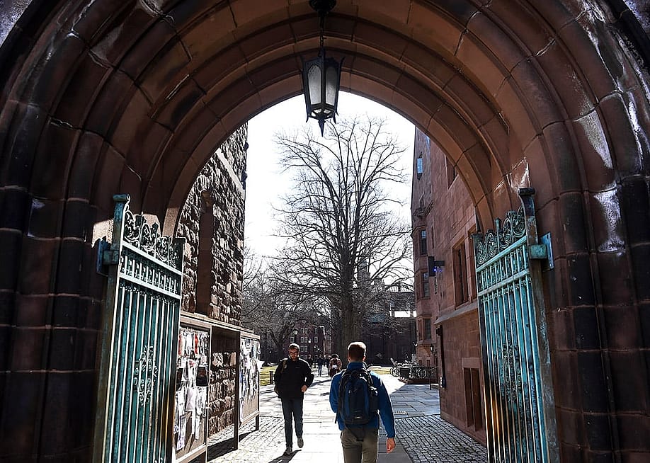 Students passing through an entrance to Yale University's old campus in New Haven, Connecticut, USA. — Arnold Gold // Connecticut Post via Getty Images