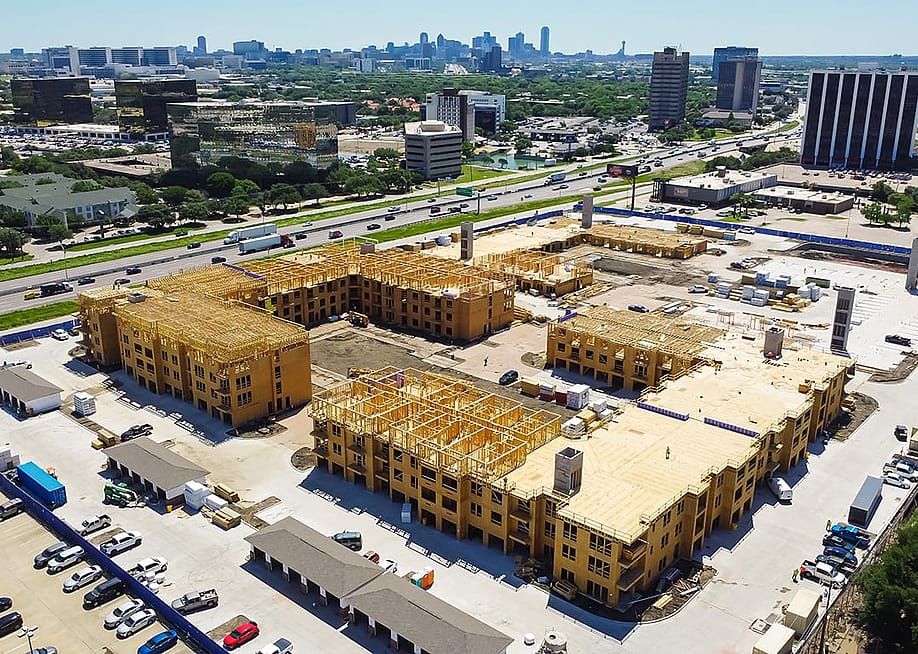 An apartment complex under construction in Dallas, Texas. — Trong Nguyen // Shutterstock