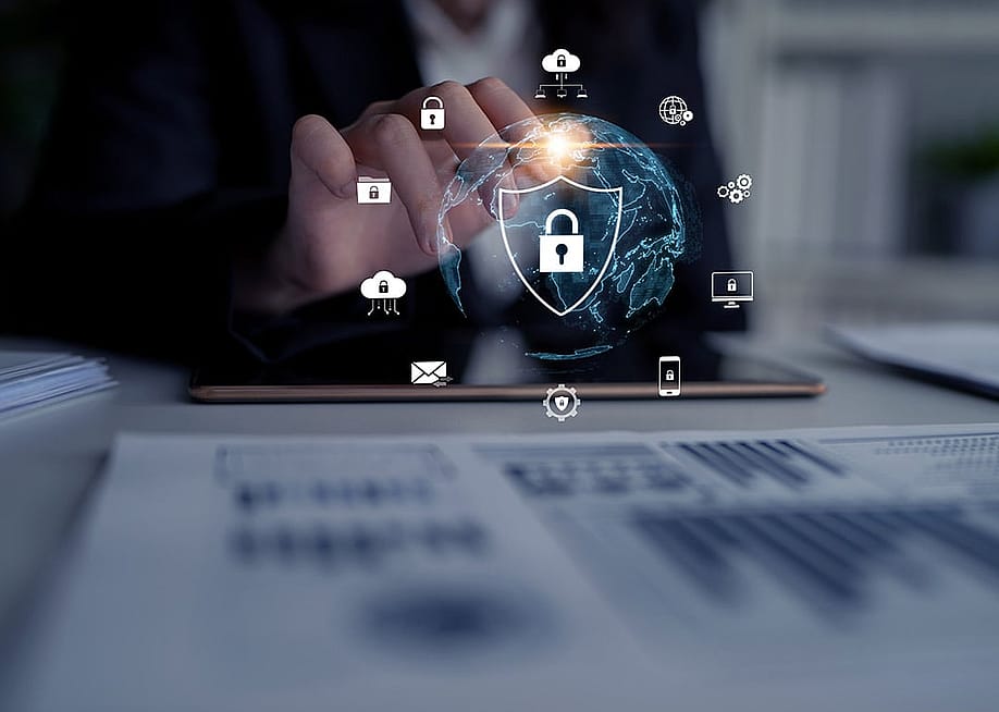 A cyber security analyst protecting digital content against breaches, hacks, and network attacks using defense strategies and tools. — Summit Art Creations // Shutterstock
