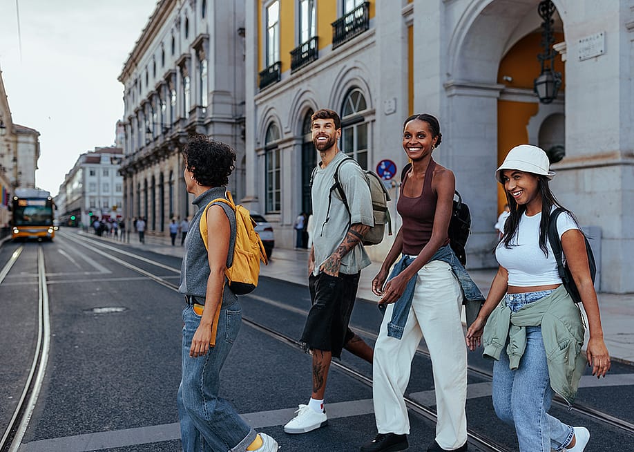 A group of friends checking out the streets of a city. — bbernard // Shutterstock