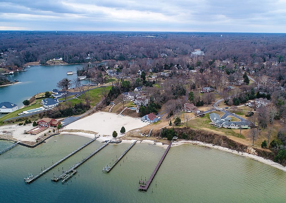 Aerial view of waterfront houses in St. Mary's County, part of the Solomon Islands in Lexington Park, Maryland. — Nicole Glass Photography // Shutterstock