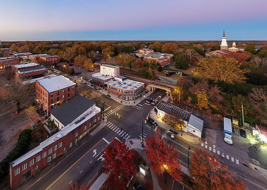 Aerial view of downtown Wake Forest in North Carolina during sunrise. — Oak City Drone // Shutterstock