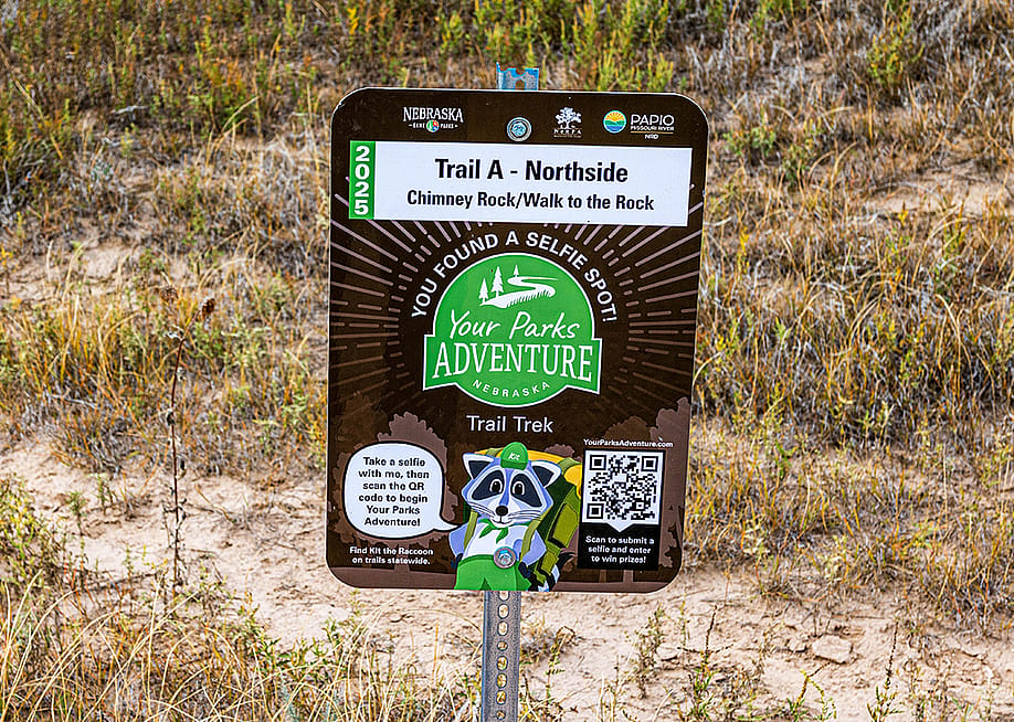 A sign with a QR code on the trail at Chimney Rock National Historic Site in Nebraska — Jeff Morgan // Shutterstock