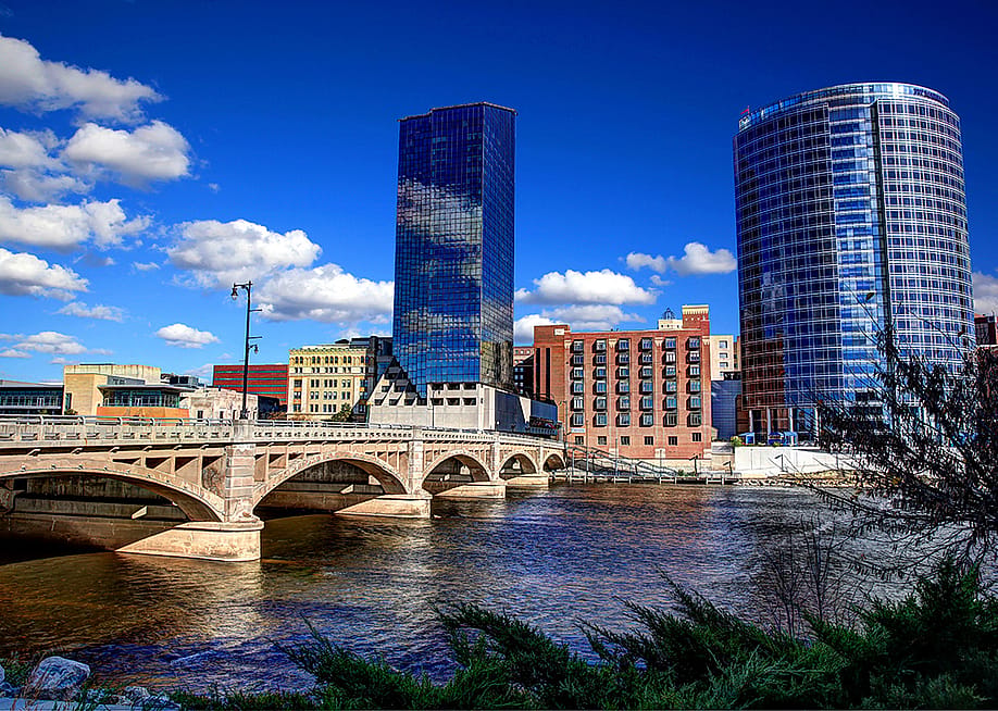 A view of Downtown Grand Rapids skyline and Grand River in Michigan, USA. — Photosbykaity // Shutterstock