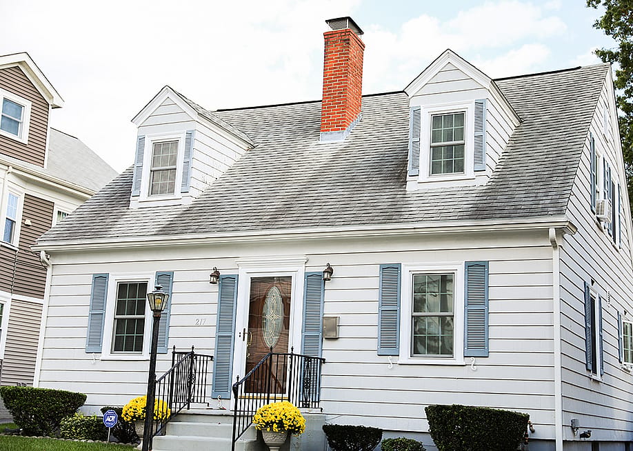 A suburban residential property. — Your Hand Please // Shutterstock