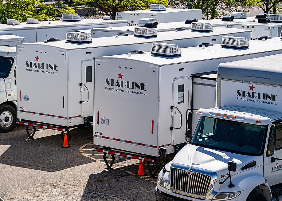A view of Starline Production rental trucks and trailers. — Erman Gunes // Shutterstock