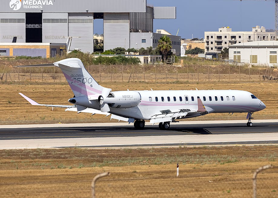 Kylie Jenner's Bombardier Global 7500 private plane on an airport runway. — InsectWorld // Shutterstock