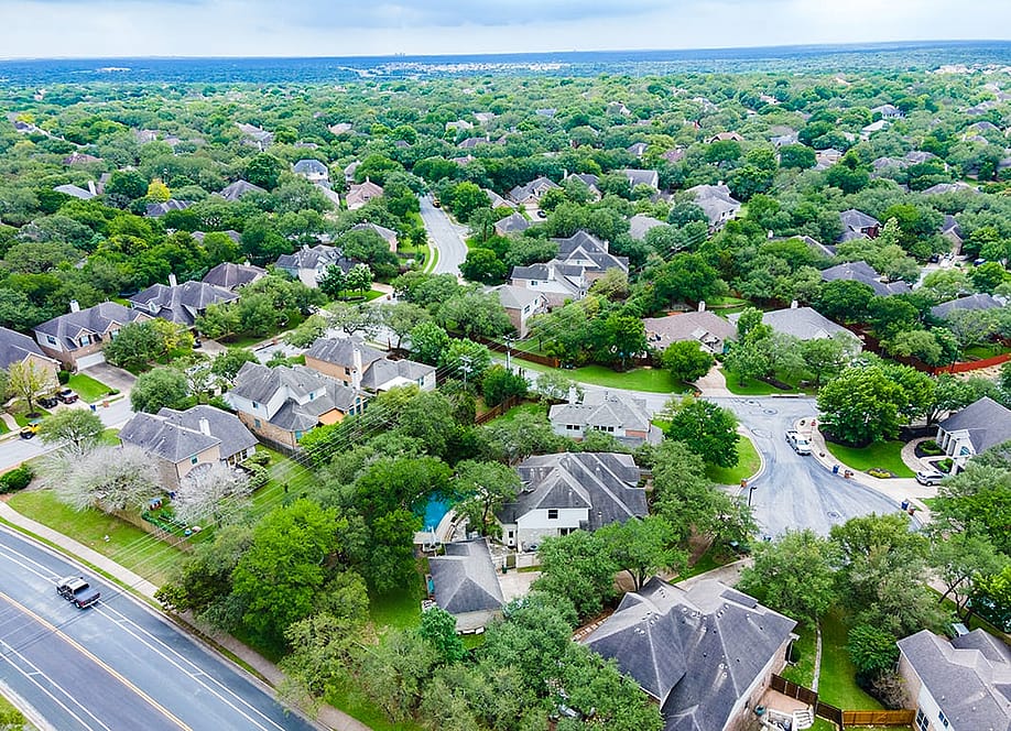 Aerial view of an urban and luxury housing neighborhood in Austin, Texas. — Roschetzky Photography // Shutterstock