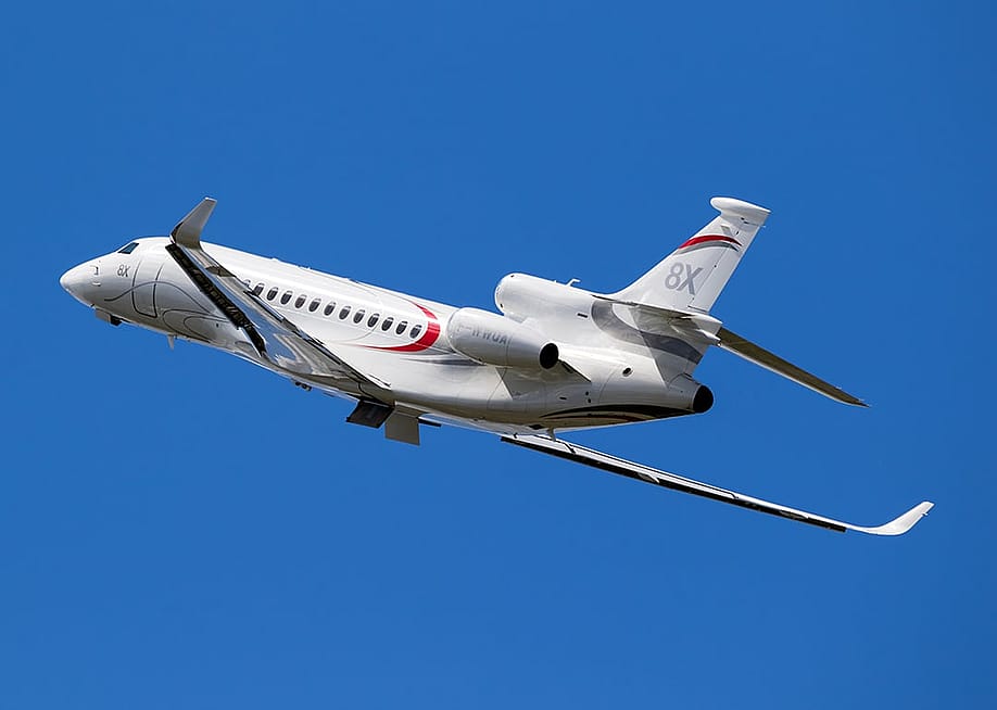 A New Dassault Falcon 8X business jet up in the air for the Paris Air Show in Le Bourget, France. — VanderWolf Images // Shutterstock