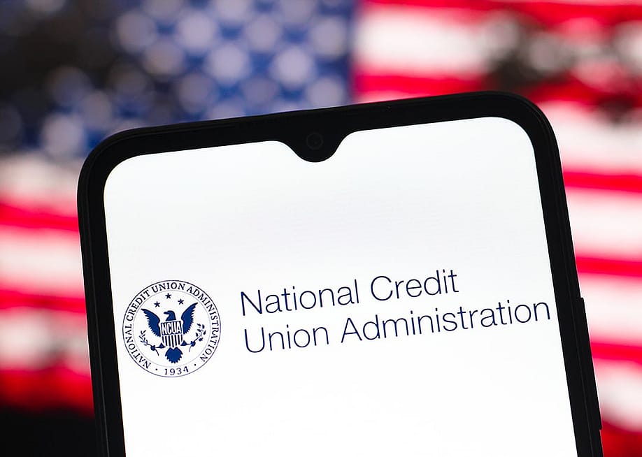 The National Credit Union Administration logo displayed on a smartphone screen. — Thomas Fuller // SOPA Images / LightRocket via Getty Images